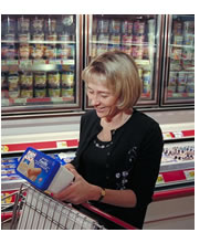 woman reading label